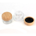 cosmetic skincare packaging supplier 25ml clear round glass cream cosmetic jar with bamboo lid